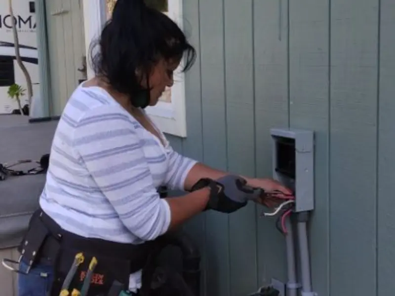 Licensed electrician wiring an exterior subpanel in Las Vegas