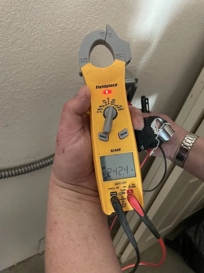 Voltage testing with clamp meter during Generator Installation in Las Vegas